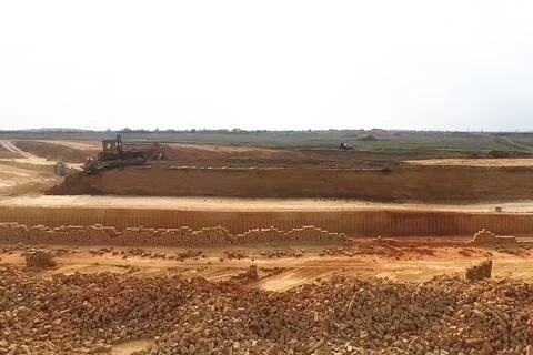 Shell quarry quarry. Cutting seashell into blocks right away in a quarry. Stock Photos