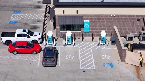 Shell Recharge electric vehicle charging station at a service plaza, Elyria Stock Footage 328228408