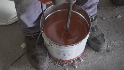 Shell Shock Fast is a thixotropic plastic that self thickens when mixed Video stock 165421947