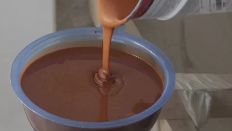 Shell Shock Fast is a thixotropic plastic that self thickens when mixed Video stock 165422592