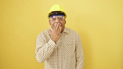 Shell-shocked middle-age latin man, hand covering mouth in surprise, securi.. Stock Footage 276172476