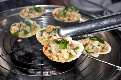 Shell steaks on the grill Stock Photos
