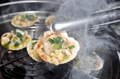Shell steaks on the grill Stock Photos