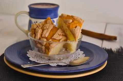 Shell sweet bread in front pieces with chocolate in a cup 스톡 사진