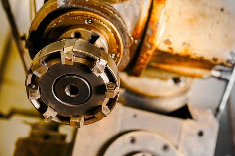 Shell type end mill installed on old machine tool in shop Stock Photos