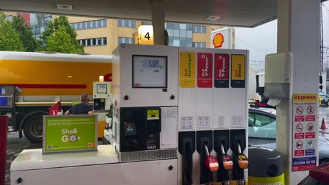 Shell V-Power logo sign with Euro prices display outdoors Stock Footage 197514691