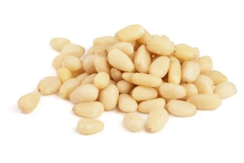 Shelled cedar pine nuts isolated on white background Foto stock