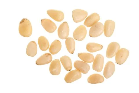 Shelled cedar pine nuts isolated on white background. Top view. Flat lay Foto stock