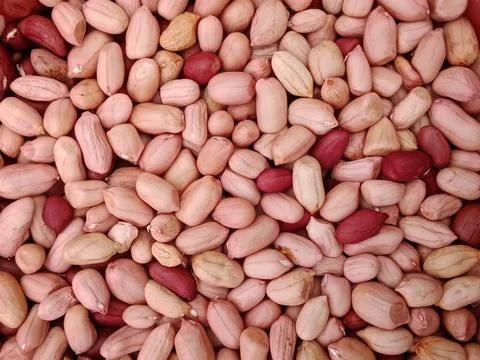 Shelled peanuts mixed color texture background close up Stock Photos