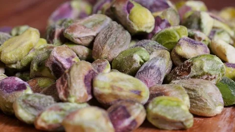 Shelled Pistachio nuts rotating Stock Footage 76438162
