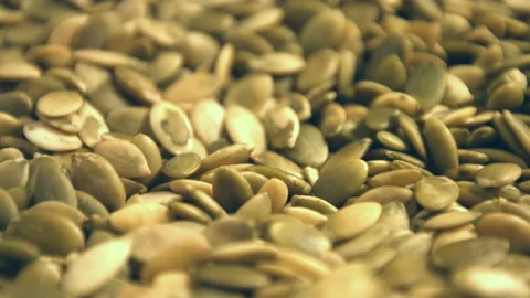 Shelled pumpkin seeds. Stockbeeldmateriaal 90196960