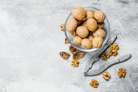 Shelled walnuts with a Nutcracker . . Stock Photos