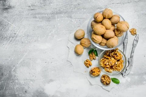 Shelled walnuts with a Nutcracker . . Stock Photos