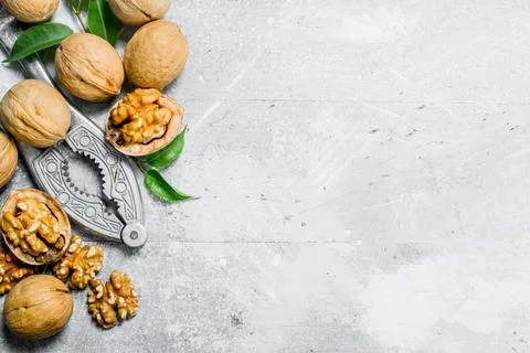 Shelled walnuts with a Nutcracker . . Stock Photos