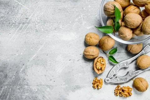 Shelled walnuts with a Nutcracker . . Stock Photos