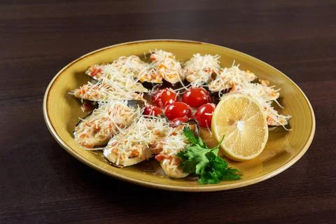 Shellfish mussels served at the restaurant Stock Photos