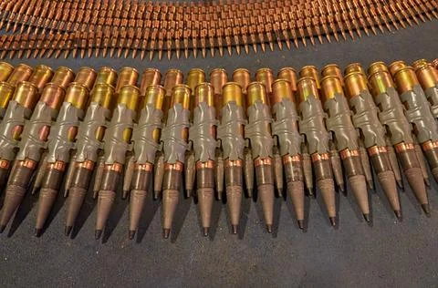 The shells for the artillery cannon are lying on the floor Stock Photos