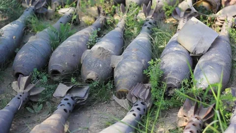 Shells, bombs in the field close-up Stock Footage 208811377