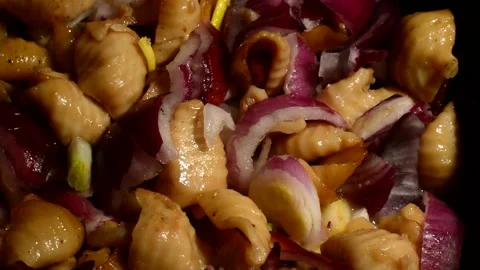 Shells pasta with red onion Stock Footage 302215583