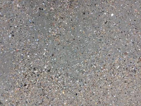 Shells in the sand on the beach background. Beach texture. Foto stock