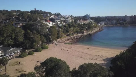 Shelly beach and multi million dollar Sydney homes 4K Stock Footage 276451249