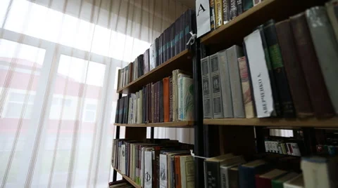 Shelves of books in library Stock Footage 54275853