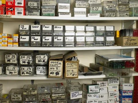 Shelves of boxes in a hardware store Foto stock