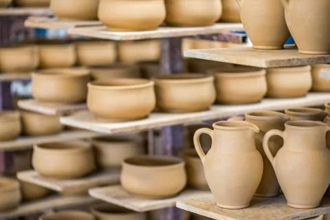 Shelves with ceramic dishware Stock Photos