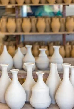 Shelves with ceramic dishware Stock Photos