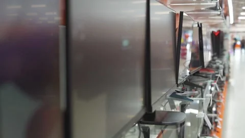 Shelves with computer monitors in an electrical goods store Stock Footage 283608029