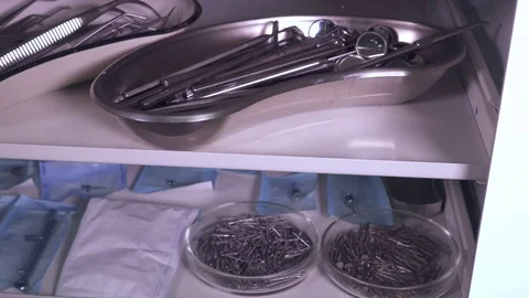 Shelves with a dentist Tools after sterilization in the medical cabinet Stock-Footage 72805557