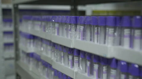Shelves with empty test tubes in the warehouse in a medical laboratory. Stock Footage 121634711