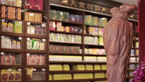 Shelves full of teas, infusions and herbal medicine at a store on Dihua Street. Stock Footage 74221900