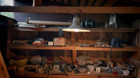 Shelves with junk in an old workshop. Stock Footage 318586258
