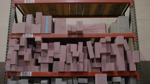 Shelves Loaded with Raw Materials to be used for Fabrication in Factory Stock Footage 125179894