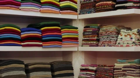 Shelves with pashminas Stock Footage 57832625