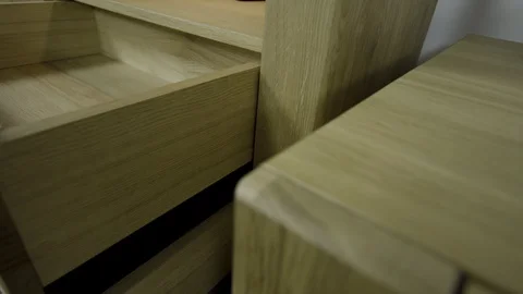Shelves shiny knobs from beautiful minimalistic chest of drawers open smoothly 스톡 동영상 127613186