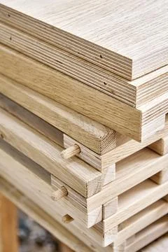 Shelves of wine rack of solid oak in the workshop closeup Stock Photos