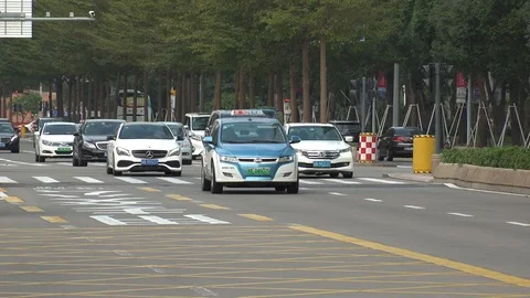 SHENZHEN, CHINA : ELECTRIC VEHICLE TAXI. | Stock Video | Pond5