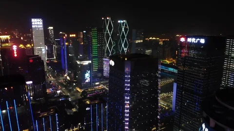 Shenzhen, China - illuminated cityscape, downtown aerial view night video Stock Footage