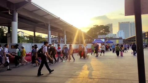 Shenzhen, China - Oct 10 2025: Urban Exterior Plaza at Sunset with Crowd Stock Footage 318731453