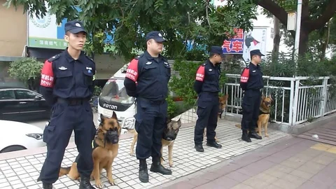 Shenzhen, China: security guards at the marathon site Stock Footage 70270726