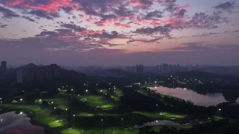 Shenzhen Golf Course at Dazzling Sunset, Aerial Drone Shot of Urban Oasis Stock Footage 319981091