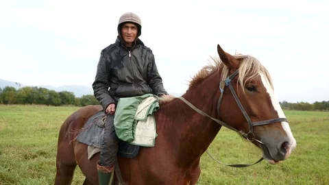 A shepherd on horseback  Stock Footage 77715529
