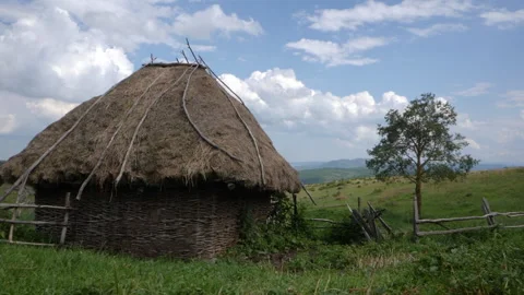 Shepherd medieval huts on mountain pass meadow Stock Footage 169808555