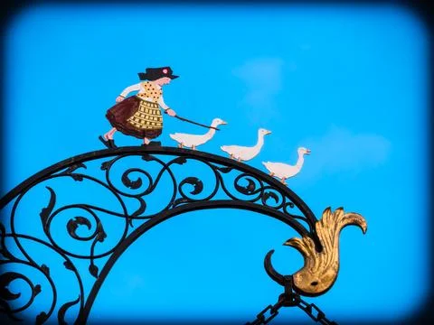 Shepherdess with geese Stock Photos