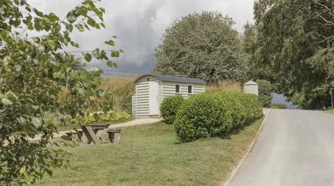 Shepherds hut by the side of a road Stock Photos