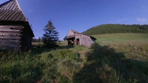 Shepherd's Huts on Mountain Pass Meadow on Sunny Day Video stock 144531569