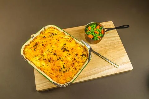 Shepherds or cottage pie in serving dish Stock Photos