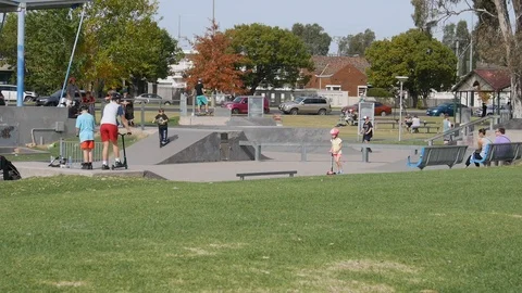 Shepparton, Australia - April 17, 2017: children playing in skate park Stock Footage